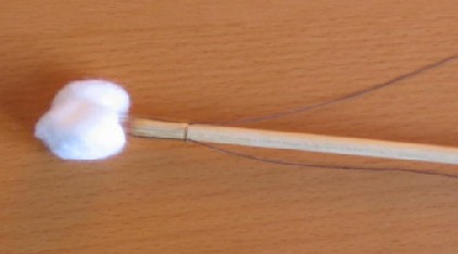 flute and whistle swab cotton tip cinched tight